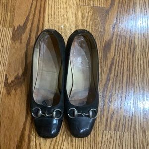 One pair of Gucci heals. Show wear and tear but still have a lot of charm